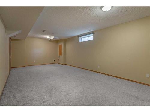 1342 Somerside Drive Sw, Calgary, AB - Indoor Photo Showing Basement