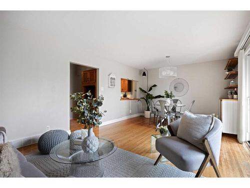 24 Heston Street Nw, Calgary, AB - Indoor Photo Showing Living Room