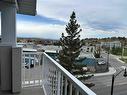 407-128 Centre Avenue, Cochrane, AB  - Outdoor With Balcony With View 