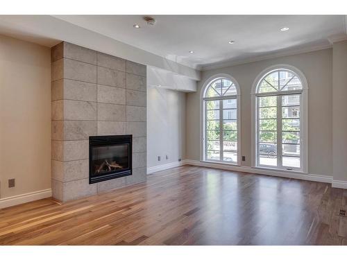 2433 Erlton Street Sw, Calgary, AB - Indoor Photo Showing Living Room With Fireplace