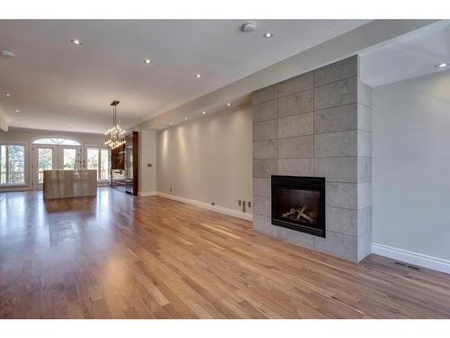 2433 Erlton Street Sw, Calgary, AB - Indoor Photo Showing Living Room With Fireplace