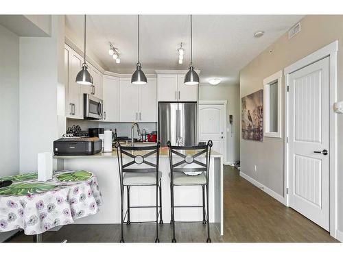 1416-130 Panatella Street Nw, Calgary, AB - Indoor Photo Showing Kitchen