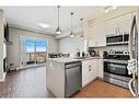 1416-130 Panatella Street Nw, Calgary, AB  - Indoor Photo Showing Kitchen 