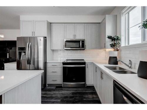 4213-15 Sage Meadows Landing Nw, Calgary, AB - Indoor Photo Showing Kitchen With Stainless Steel Kitchen With Double Sink With Upgraded Kitchen