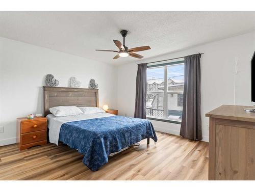 64 Pennsburg Way Se, Calgary, AB - Indoor Photo Showing Bedroom