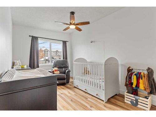 64 Pennsburg Way Se, Calgary, AB - Indoor Photo Showing Bedroom