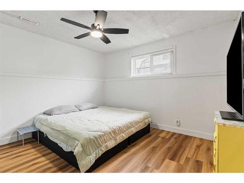 64 Pennsburg Way Se, Calgary, AB - Indoor Photo Showing Bedroom