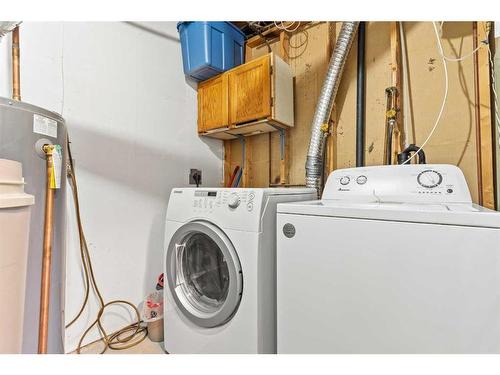 64 Pennsburg Way Se, Calgary, AB - Indoor Photo Showing Laundry Room