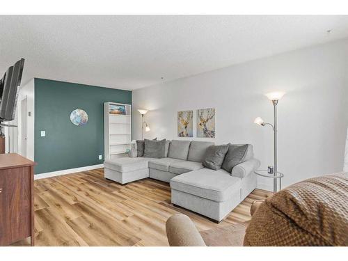 64 Pennsburg Way Se, Calgary, AB - Indoor Photo Showing Living Room