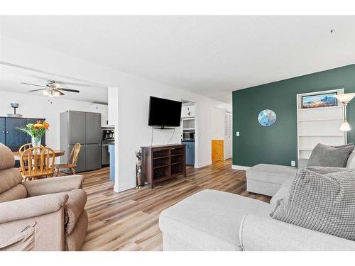 64 Pennsburg Way Se, Calgary, AB - Indoor Photo Showing Living Room