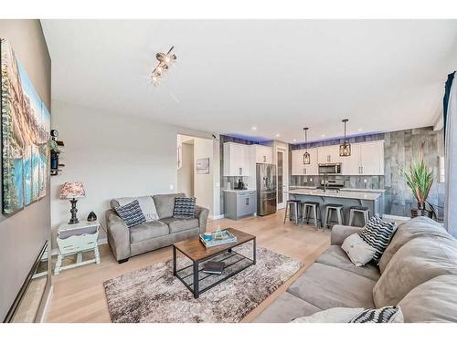 245 Precedence View, Cochrane, AB - Indoor Photo Showing Living Room