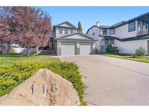 116 Oakmere Place, Chestermere, AB - Outdoor With Facade