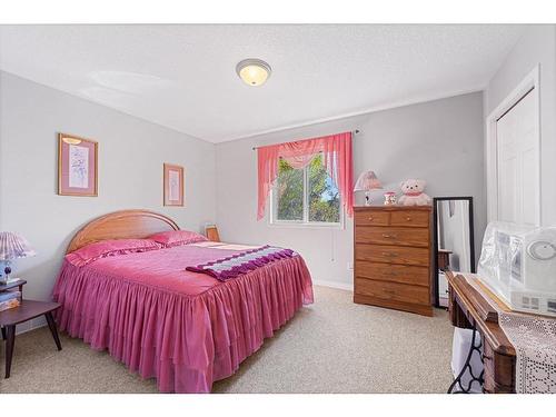 116 Oakmere Place, Chestermere, AB - Indoor Photo Showing Bedroom