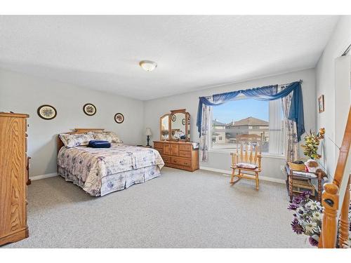 116 Oakmere Place, Chestermere, AB - Indoor Photo Showing Bedroom