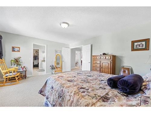 116 Oakmere Place, Chestermere, AB - Indoor Photo Showing Bedroom