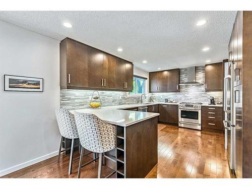 12032 Elbow Drive Sw, Calgary, AB - Indoor Photo Showing Kitchen With Stainless Steel Kitchen With Upgraded Kitchen