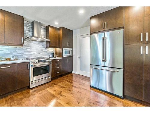 12032 Elbow Drive Sw, Calgary, AB - Indoor Photo Showing Kitchen With Stainless Steel Kitchen With Upgraded Kitchen