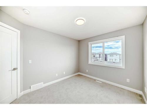 425 Chelsea Key, Chestermere, AB - Indoor Photo Showing Other Room