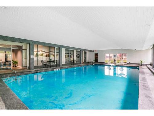 904-4944 Dalton Drive Nw, Calgary, AB - Indoor Photo Showing Other Room With In Ground Pool