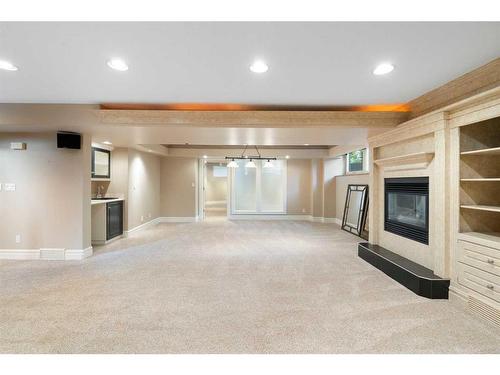 307 Wildwood Drive Sw, Calgary, AB - Indoor Photo Showing Other Room With Fireplace