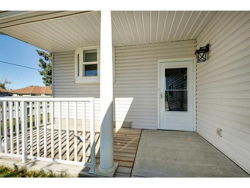 1-717 Centre Street, Vulcan, AB - Outdoor With Deck Patio Veranda With Exterior