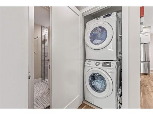 201G-1101 Three Sisters Parkway, Canmore, AB - Indoor Photo Showing Laundry Room