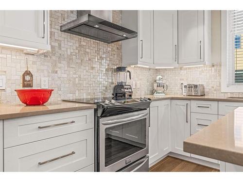 201G-1101 Three Sisters Parkway, Canmore, AB - Indoor Photo Showing Kitchen With Upgraded Kitchen