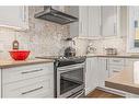 201G-1101 Three Sisters Parkway, Canmore, AB  - Indoor Photo Showing Kitchen With Upgraded Kitchen 