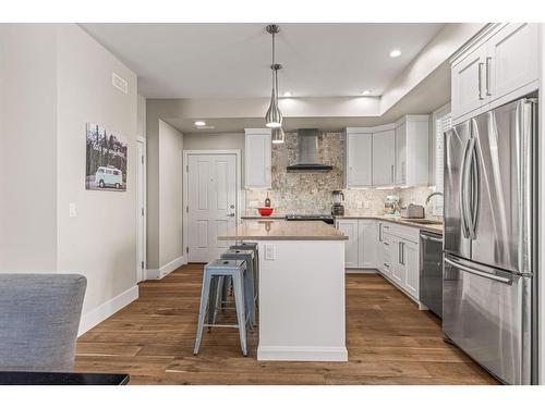 201G-1101 Three Sisters Parkway, Canmore, AB - Indoor Photo Showing Kitchen With Stainless Steel Kitchen With Upgraded Kitchen