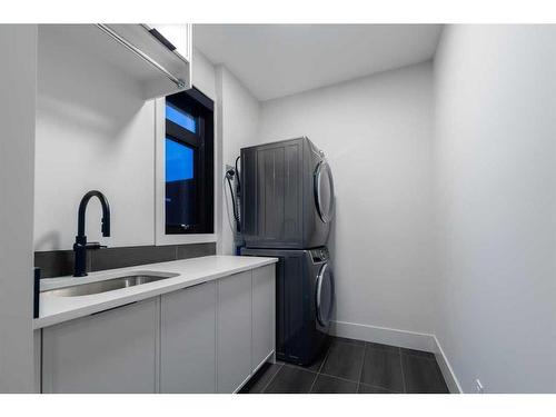 94 Aspen Summit Close Sw, Calgary, AB - Indoor Photo Showing Laundry Room