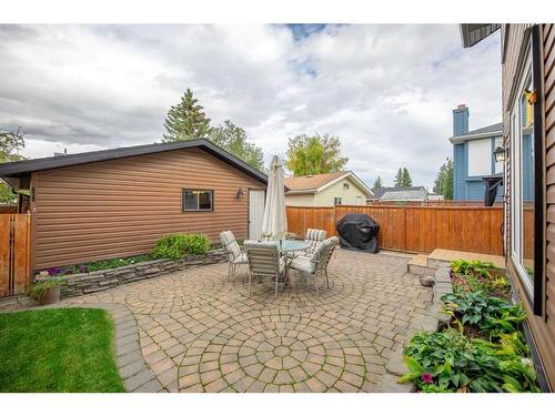 128 Woodfield Close Sw, Calgary, AB 