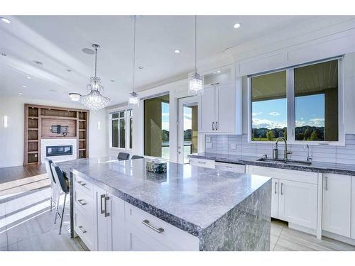 128 Kinniburgh Loop, Chestermere, AB - Indoor Photo Showing Kitchen With Upgraded Kitchen