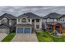 128 Kinniburgh Loop, Chestermere, AB  - Outdoor With Facade 