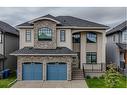 128 Kinniburgh Loop, Chestermere, AB  - Outdoor With Facade 