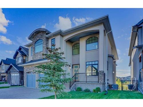 128 Kinniburgh Loop, Chestermere, AB - Outdoor With Facade