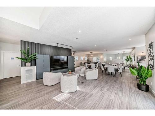 408-30 Royal Oak Plaza Nw, Calgary, AB - Indoor Photo Showing Living Room With Fireplace