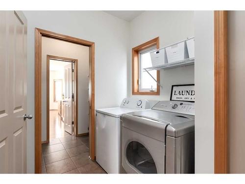 126 West Pointe Court, Cochrane, AB - Indoor Photo Showing Laundry Room