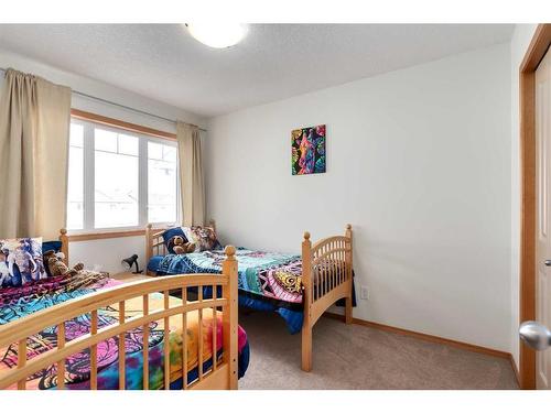 126 West Pointe Court, Cochrane, AB - Indoor Photo Showing Bedroom