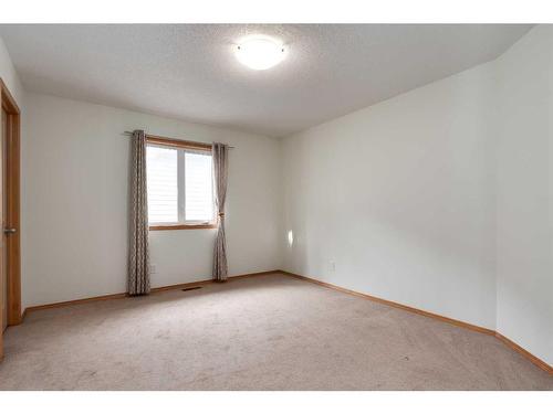 126 West Pointe Court, Cochrane, AB - Indoor Photo Showing Other Room