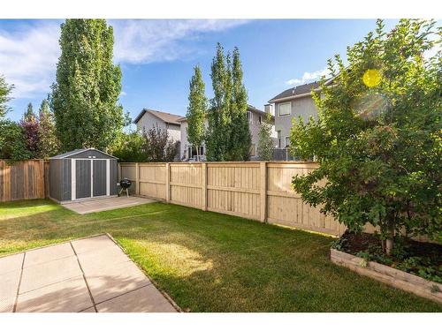 126 West Pointe Court, Cochrane, AB - Outdoor With Backyard