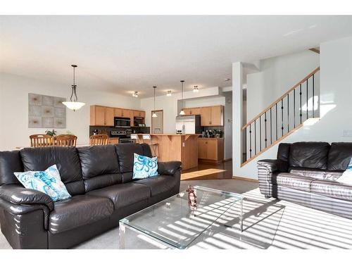 126 West Pointe Court, Cochrane, AB - Indoor Photo Showing Living Room