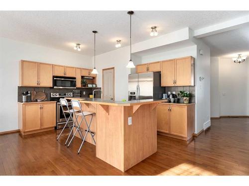 126 West Pointe Court, Cochrane, AB - Indoor Photo Showing Kitchen