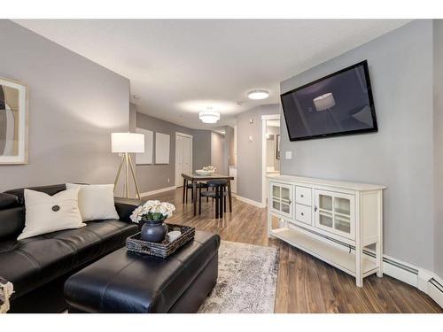 103-30 Sierra Morena Mews Sw, Calgary, AB - Indoor Photo Showing Living Room