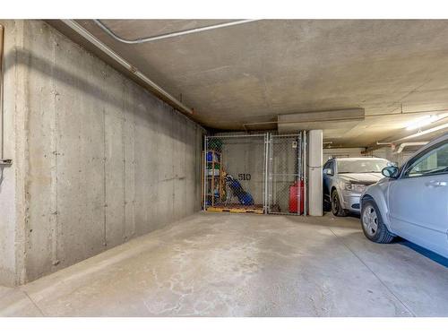 103-30 Sierra Morena Mews Sw, Calgary, AB - Indoor Photo Showing Garage