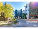 103-30 Sierra Morena Mews Sw, Calgary, AB  - Outdoor With Balcony With Facade 