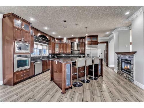 250040 Dynasty Drive West, Rural Foothills County, AB - Indoor Photo Showing Kitchen With Upgraded Kitchen