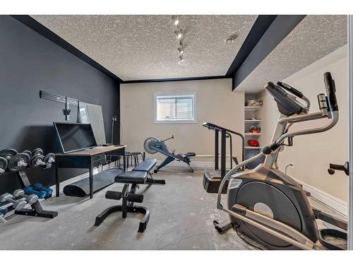 250040 Dynasty Drive West, Rural Foothills County, AB - Indoor Photo Showing Gym Room