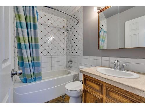 56 Millbank Close Sw, Calgary, AB - Indoor Photo Showing Bathroom