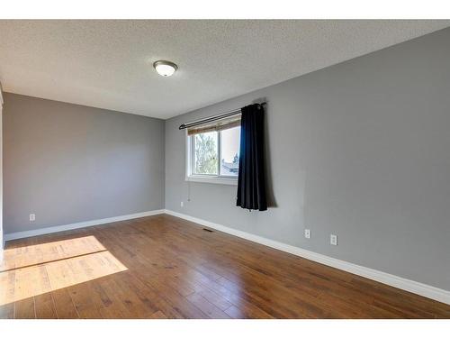 56 Millbank Close Sw, Calgary, AB - Indoor Photo Showing Other Room