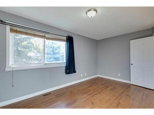 56 Millbank Close Sw, Calgary, AB - Indoor Photo Showing Other Room